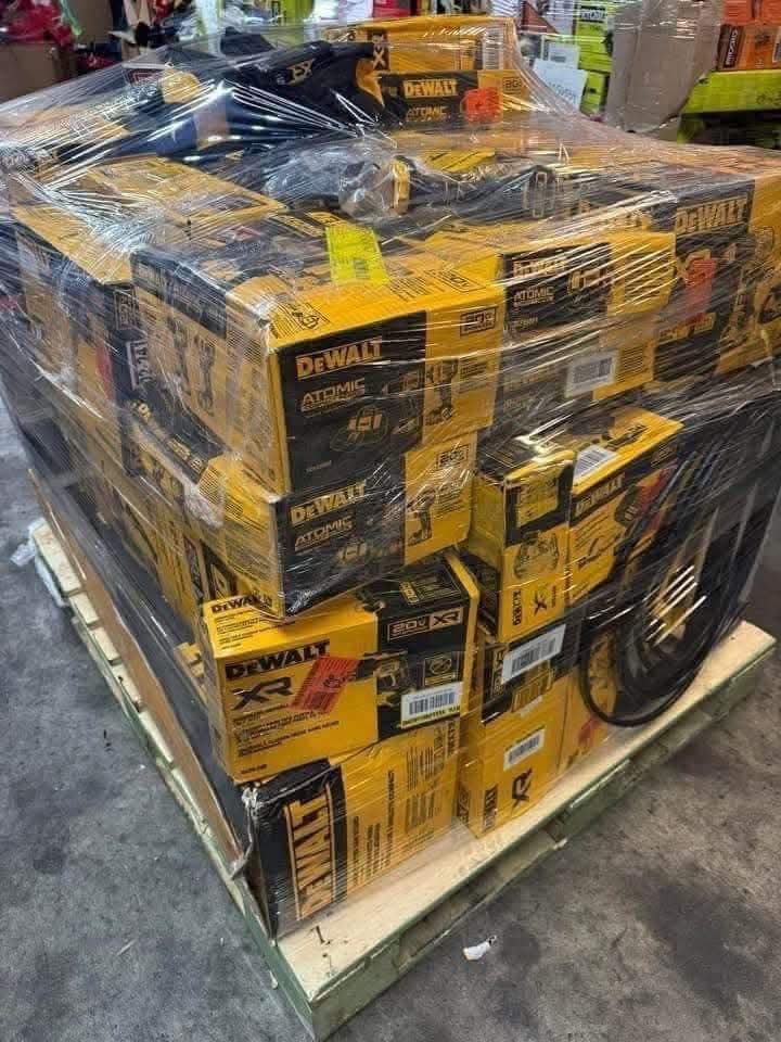 Large mixed return pallet featuring a variety of original branded power tools, all fully functional and tested for quality