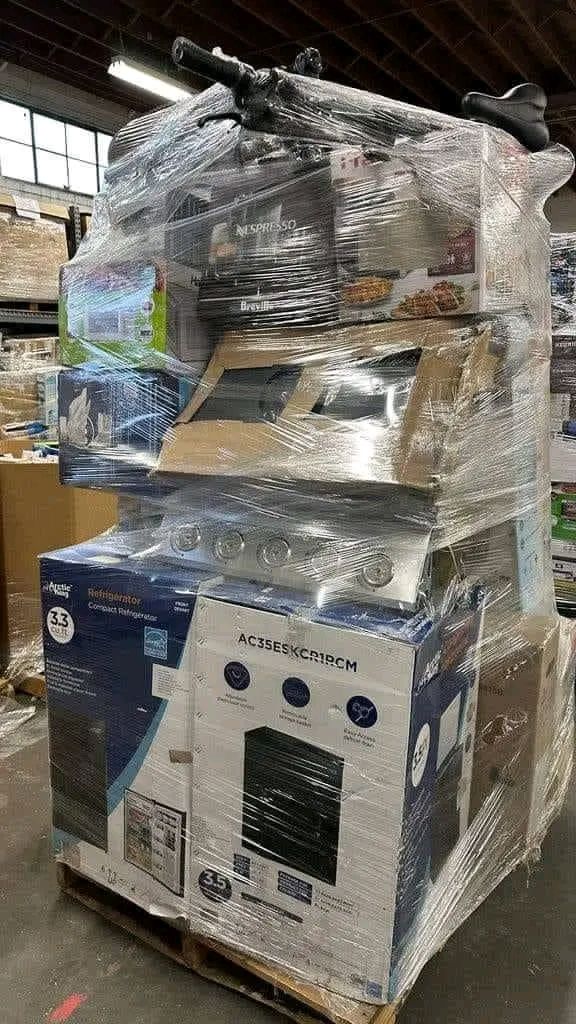Return pallet filled with a wide variety of kitchen utensils and appliances.